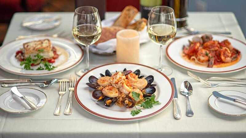 Three plated entrees focused on shrimp and mussels.
